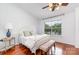 Bedroom with a ceiling fan and a sunny window view at 5011 Sharon Rd # B, Charlotte, NC 28210