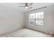 Bright bedroom with a large window and neutral carpet at 5011 Sharon Rd # B, Charlotte, NC 28210
