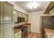 Well-equipped kitchen with stainless steel appliances, granite counters, and ample cabinet space at 5011 Sharon Rd # B, Charlotte, NC 28210