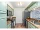 Modern kitchen with stainless steel appliances and granite countertops at 5011 Sharon Rd # B, Charlotte, NC 28210