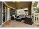 Outdoor patio featuring comfortable wicker seating, ideal for relaxing and enjoying the view at 5011 Sharon Rd # B, Charlotte, NC 28210
