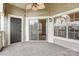 Relaxing covered patio with sliding glass doors to indoor living area at 5011 Sharon Rd # B, Charlotte, NC 28210