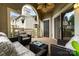 Cozy outdoor patio with a ceiling fan, comfortable wicker furniture, and relaxing space at 5011 Sharon Rd # B, Charlotte, NC 28210