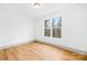 Bright bedroom with a large window bringing in natural light and views of the outdoors at 5147 Star Magnolia Ct, Clover, SC 29710