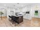 Spacious kitchen with a large center island, bar stool seating, and plenty of cabinet space at 5147 Star Magnolia Ct, Clover, SC 29710