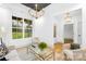 Cozy living room with a large window, natural light, and neutral-toned furniture at 5147 Star Magnolia Ct, Clover, SC 29710