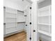 Walk-in closet with built-in shelving for optimal organization and plenty of storage space at 5147 Star Magnolia Ct, Clover, SC 29710