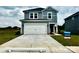Charming two-story home featuring a spacious two-car garage and inviting curb appeal at 5208 Georgette Trl, Cherryville, NC 28021
