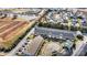 Aerial view of townhome community showcasing mature trees and landscaping at 5472 Ives Nw St, Concord, NC 28027