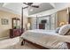 Bedroom featuring a four poster bed, plenty of natural light, and comfortable seating at 5472 Ives Nw St, Concord, NC 28027