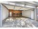 Spacious attached garage with ample storage space and access to the home at 5472 Ives Nw St, Concord, NC 28027