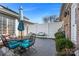 Private outdoor patio with furniture, landscaping, and privacy fence at 5472 Ives Nw St, Concord, NC 28027