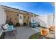 Charming outdoor patio with seating area and well-maintained landscaping at 5472 Ives Nw St, Concord, NC 28027