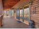 Charming front porch with rustic details, offering a welcoming entrance to this beautifully designed home at 5981 Johnson Rd, Lake Wylie, SC 29710