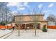 Home featuring a spacious backyard patio with outdoor seating and an inviting covered porch at 8104 Stem Ct, Charlotte, NC 28227