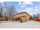 Beautifully landscaped backyard showcasing a spacious patio and a covered porch, perfect for outdoor entertaining at 8104 Stem Ct, Charlotte, NC 28227