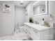 Elegant bathroom featuring a modern vanity, stylish fixtures, and neutral wall color at 8104 Stem Ct, Charlotte, NC 28227