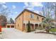 Stylish two-story home with an attached three-car garage and a well-maintained yard at 8104 Stem Ct, Charlotte, NC 28227