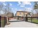 Stately home with a secure gated entrance and a well-manicured lawn at 8104 Stem Ct, Charlotte, NC 28227