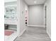 Hallway that leads to a bedroom and bathroom. Features a modern design with neutral walls and floors at 8104 Stem Ct, Charlotte, NC 28227