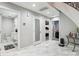 Bright hallway with marble flooring leading to bathroom and bedrooms at 8104 Stem Ct, Charlotte, NC 28227