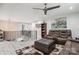 Upstairs Living Room featuring a leather couch, a bookshelf, and a carpet at 8104 Stem Ct, Charlotte, NC 28227