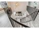 Open-concept living room featuring a modern fireplace, white sofas, elegant lighting, and stylish decor at 8104 Stem Ct, Charlotte, NC 28227