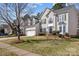 Charming two-story home featuring a well-manicured lawn and a classic architectural design at 910 Elrond Nw Dr, Charlotte, NC 28269
