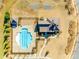 Aerial view of the community pool area, featuring a large pool, cabana, and seating at 1024 Mayapple Way, Belmont, NC 28012