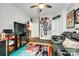 The living room is decorated with movie-themed decor and has leather furniture at 1024 Mayapple Way, Belmont, NC 28012