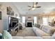 Cozy living room with fireplace, plush seating, and plenty of natural light at 1024 Mayapple Way, Belmont, NC 28012
