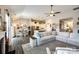 Open floor plan with a dining area, kitchen, and living room, perfect for entertaining and Gathering gatherings at 1024 Mayapple Way, Belmont, NC 28012