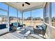 Relaxing screened patio with comfortable seating and a view of the spacious backyard at 1024 Mayapple Way, Belmont, NC 28012