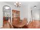 Inviting dining room with wood table and chairs, open to kitchen area at 109 Putney Ct, Salisbury, NC 28147