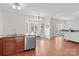 Bright kitchen with stainless steel dishwasher that flows into the living room space at 109 Putney Ct, Salisbury, NC 28147