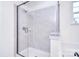 Bathroom showcasing glass-enclosed shower with tiled walls, and a separate soaking tub with black hardware at 111 Megby Trl, Statesville, NC 28677