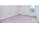 Bedroom featuring a large window, carpeted floors, and neutral colored walls at 111 Megby Trl, Statesville, NC 28677