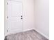 Mud room with hardwood floors and door leading to the exterior at 111 Megby Trl, Statesville, NC 28677