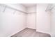 Walk-in closet features carpeted floors and wire shelving for optimal organization and storage of personal belongings at 111 Megby Trl, Statesville, NC 28677