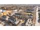 Expansive community showing residential buildings amidst lush greenery and tree-lined streets at 1127 Central Park Cir, Davidson, NC 28036