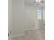 Neutral bedroom featuring carpet floors and a large window for natural light at 1127 Central Park Cir, Davidson, NC 28036