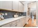 Kitchen with granite countertops, gray backsplash, and stainless steel appliances at 114 Tomahawk Dr, Mooresville, NC 28117