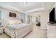 Spacious main bedroom with tray ceiling and sitting area at 114 Tomahawk Dr, Mooresville, NC 28117