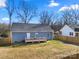 Spacious backyard with a wooden deck, perfect for outdoor entertaining and relaxation at 131 Lowry Row # 8, York, SC 29745