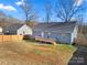 Expansive backyard with a wooden deck and partial fencing, offering privacy and space at 131 Lowry Row # 8, York, SC 29745