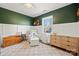 Inviting Bedroom features a plush rug, an accent wall, and a comfortable rocking chair at 131 Lowry Row # 8, York, SC 29745