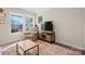 Cozy living room area with a comfortable recliner and a large window offering ample natural light at 131 Lowry Row # 8, York, SC 29745