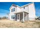 Two-story home with a screened porch, offering a private outdoor space at 140 Jana Dr, Statesville, NC 28677