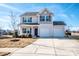 Charming two-story home with a three-car garage and manicured front lawn at 140 Jana Dr, Statesville, NC 28677
