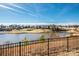 Scenic view overlooking a tranquil lake and golf course, enhancing the community's charm at 140 Jana Dr, Statesville, NC 28677
